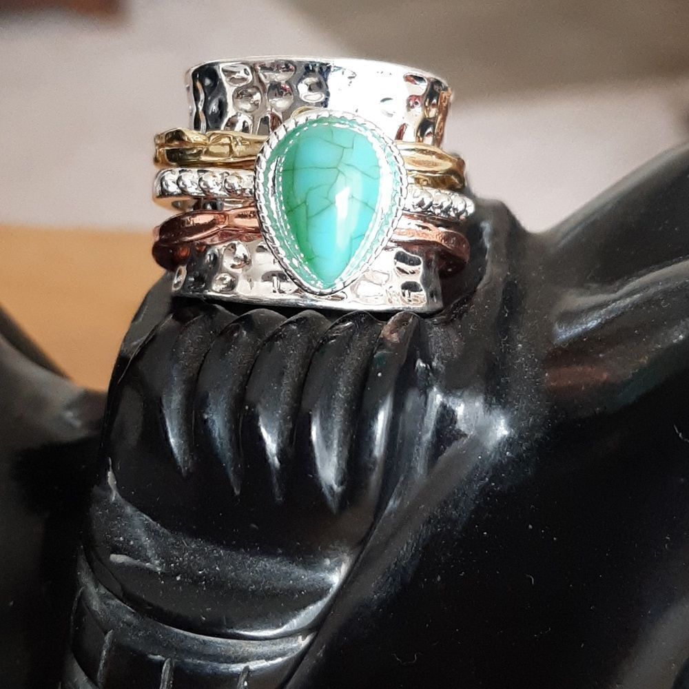 NWOT Wide band worry silver alloy ring with faux green stone